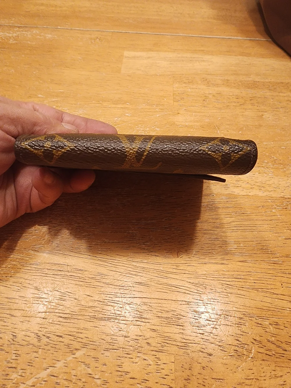 vintage Louis Vuitton Monogram Elise Wallet crafted in the classic brown LV
